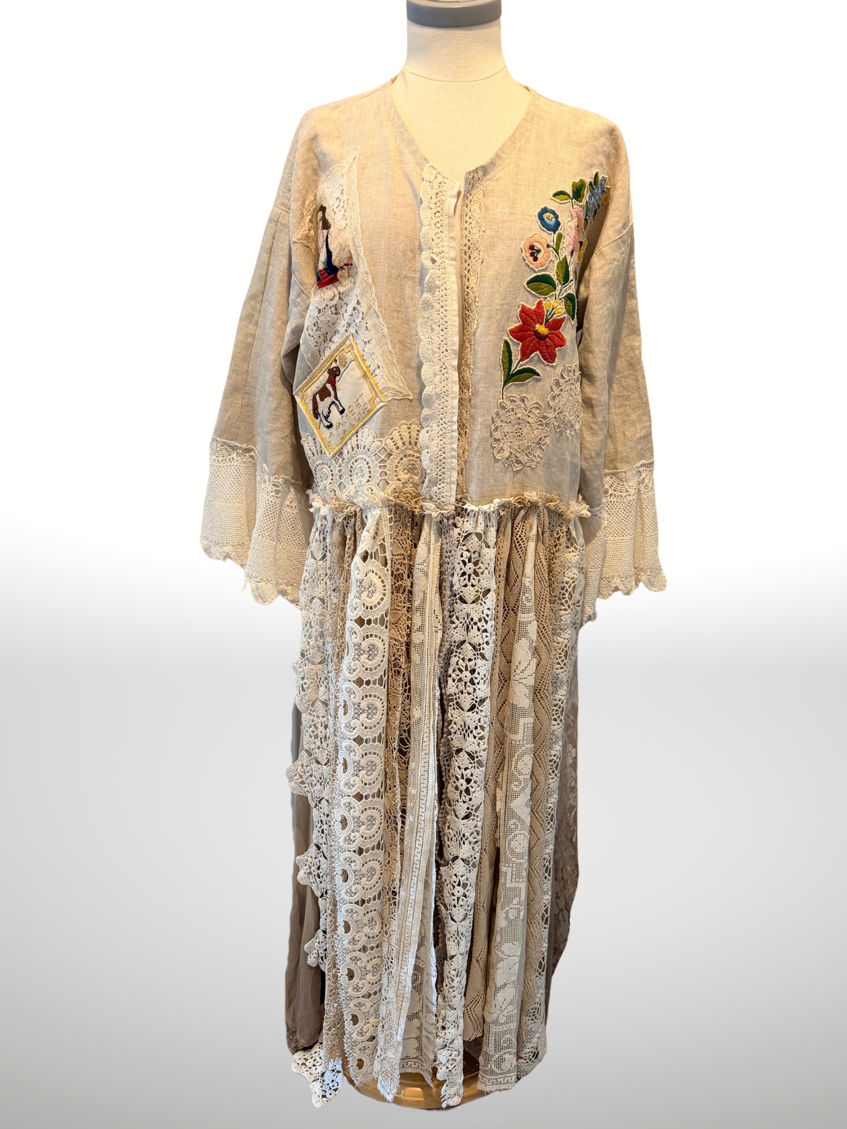 A repurposed tunic and skirt creation with applique and lace